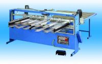 Mattress covering machine