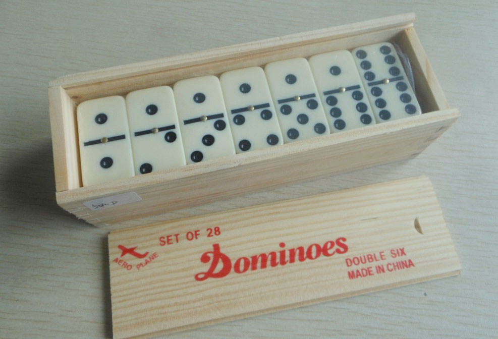 dominoes in wooden box