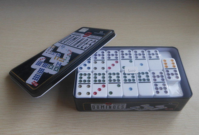 Dominoes in tin box