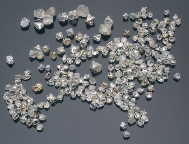 Natural Rough Cut and Uncut Diamonds.