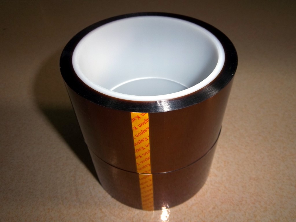 Adhesive kapton tape die cutting