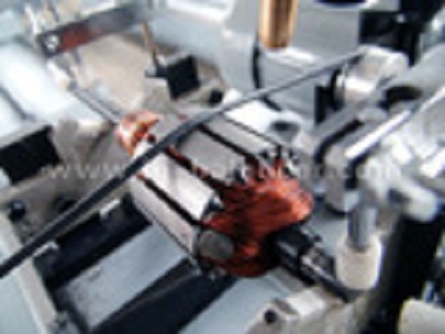 Shaded pole motor balancing machine