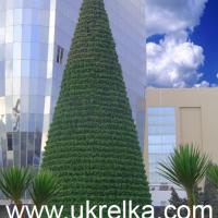 Large picture giant artificial Christmas tree