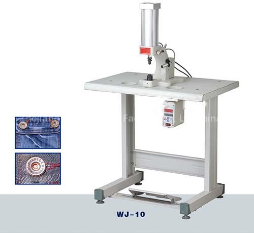 Electric snap button attaching machine
