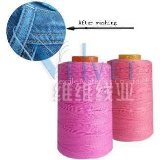 Polyester wrapped polyester core spun sewing thread