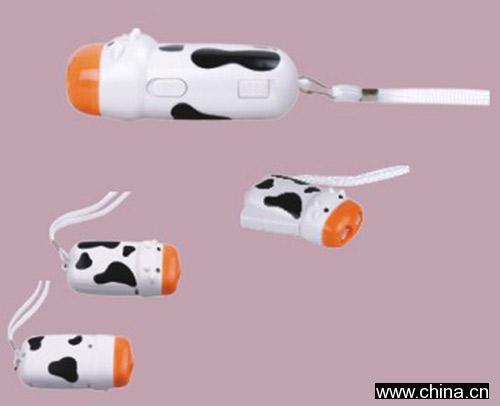 Milch Cow Shaped Hand Pressing Flashlight