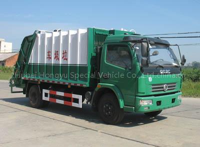 Compressing garbage truck