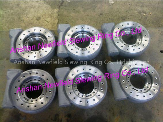 Slewing drive of rotary device in stock