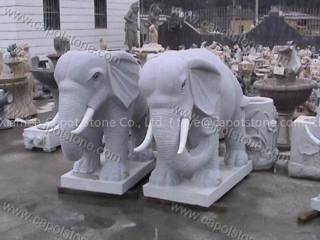 stone carving,stone statue,stone sculpture,granite carving