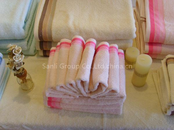 solid dyed towel with the satin border