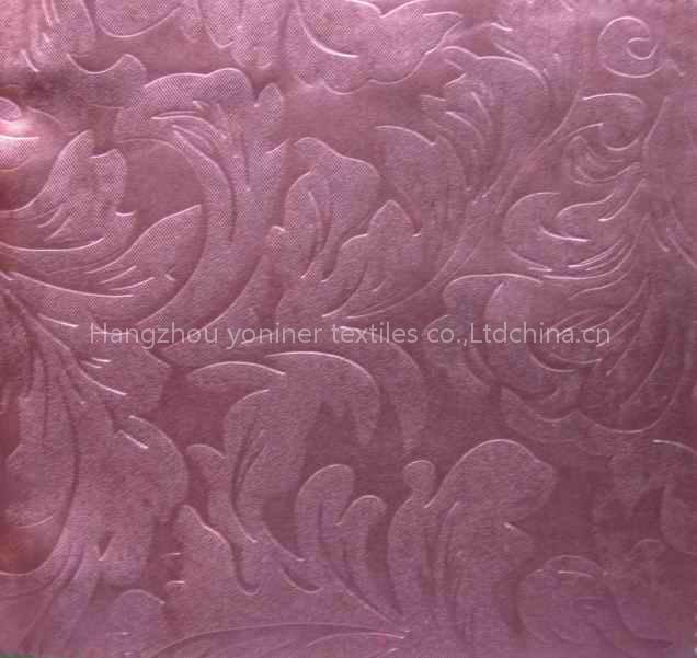 Embossed blackout fabric
