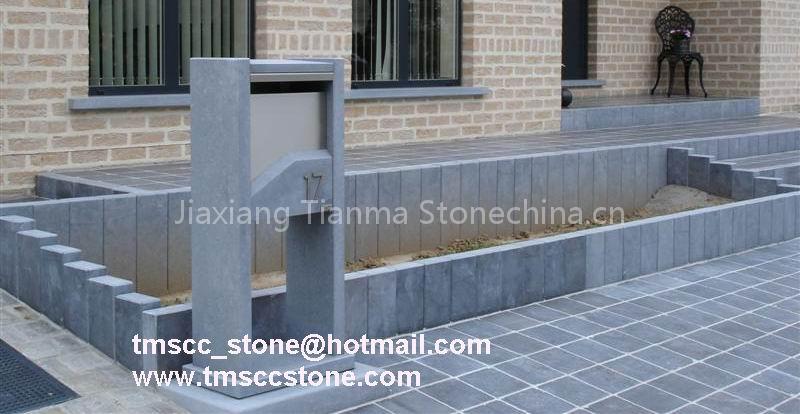 Blue stone tiles and mailbox
