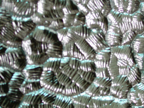 Stone--patterned mirror