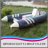 rigid hull inflatable boat with trailer, motor