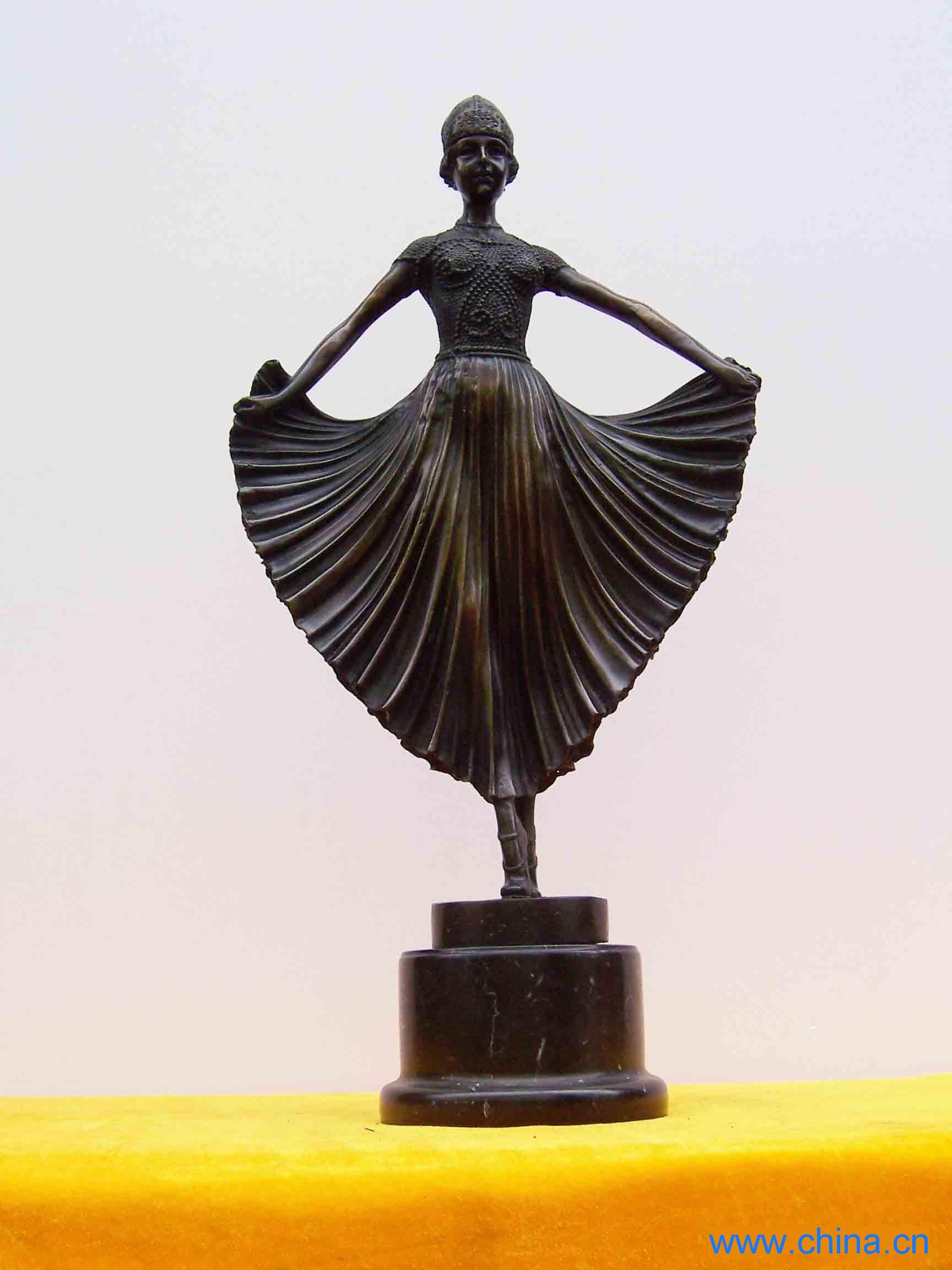 Bronze dance statue