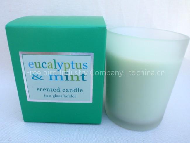 scented soy candle in glass jar