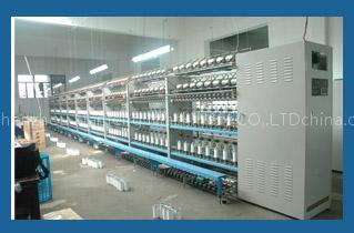 Covering yarn machine