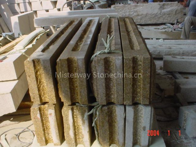 Rusty yellow granite walling
