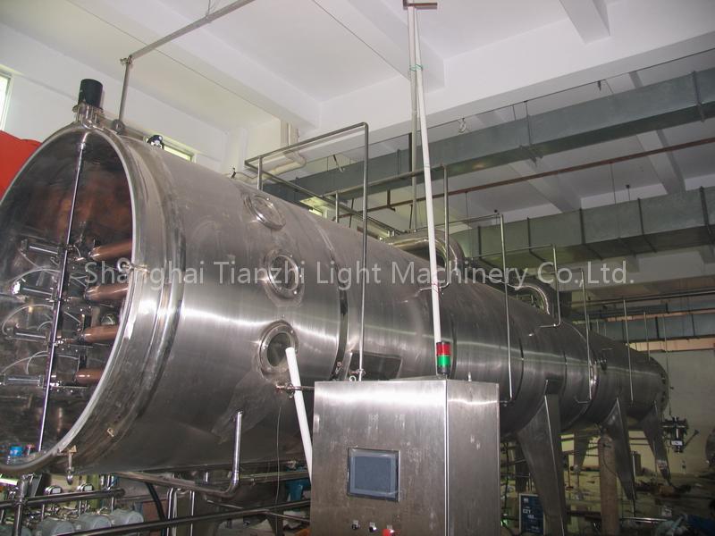Vacuum belt drier