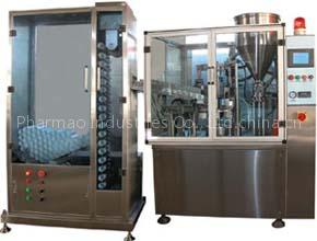 TUBE FILLING AND SEALING MACHINE