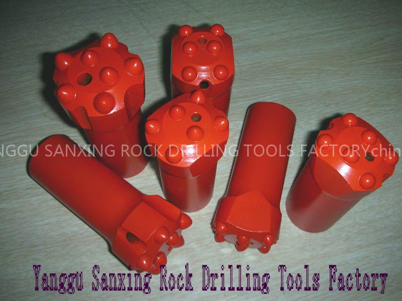 tpaer button bit