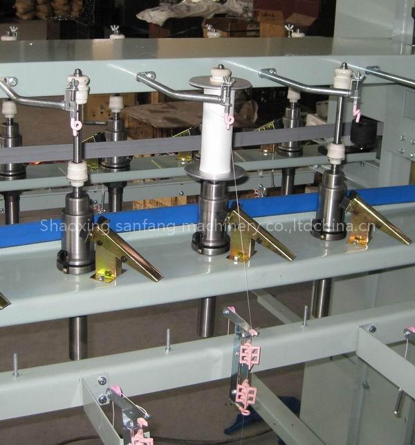 Flanged bobbin spooler machine