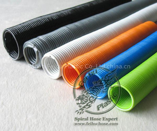 Spring stretch hose for vacuum cleaners